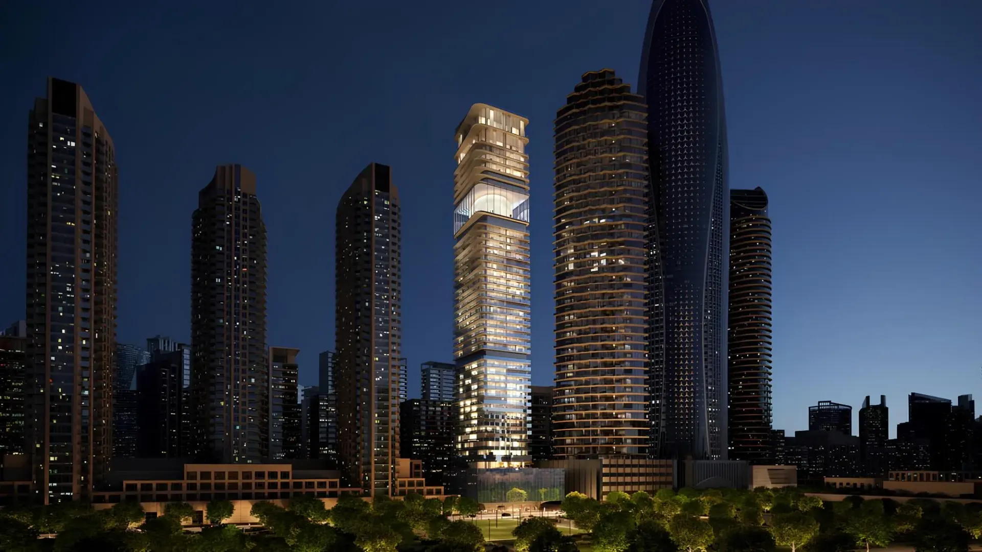 Inaura Hotel & Branded Residences – apšviestas bokštas tarp Downtown Dubai dangoraižių naktį
