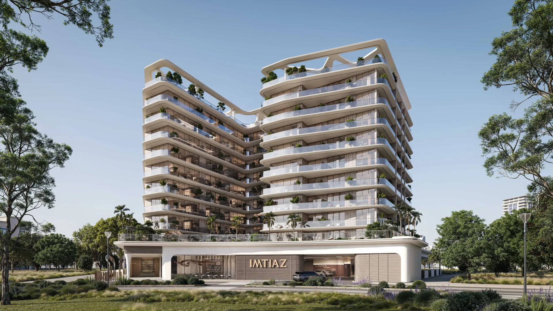 Enre Residence by Imtiaz – dviejų korpusų gyvenamasis pastatas su balkonais ir žalumynais
